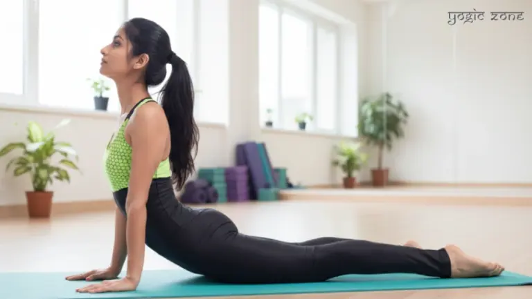 Lady doing the Bhujangasana. Blog on yoga for back pain by yogiczone.com