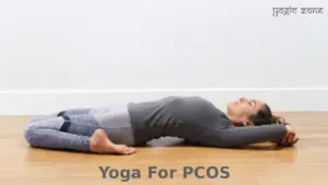 lady in Supta Veerasana or Reclined Hero pose for yoga for PCOS